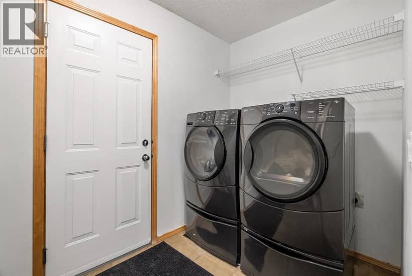 116 Tuscany Ravine Crescent NW — photo 10 of 36
