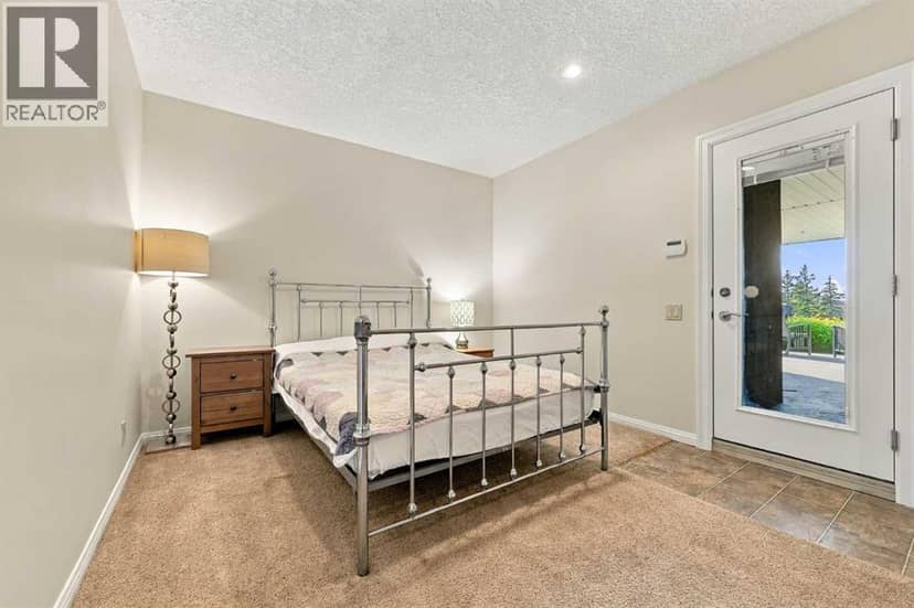65 Aspen Ridge Crescent SW — photo 39 of 40