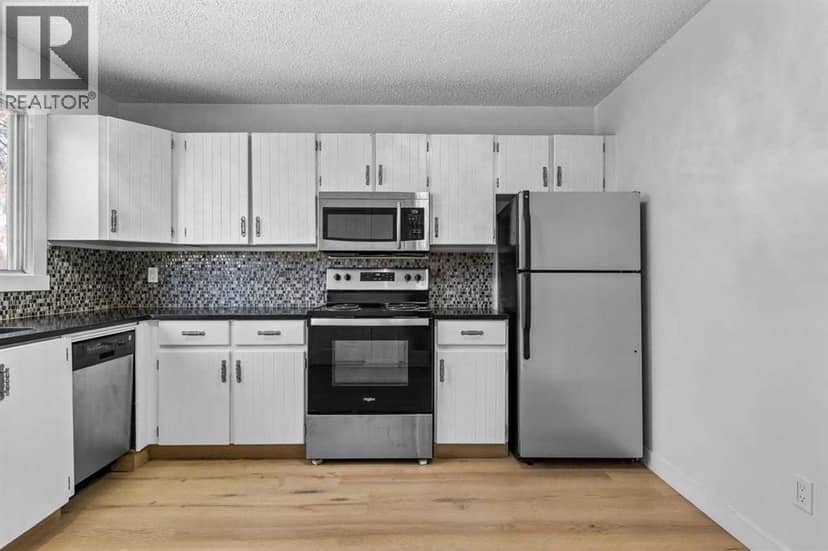 7006A Bowness Road NW — photo 10 of 27