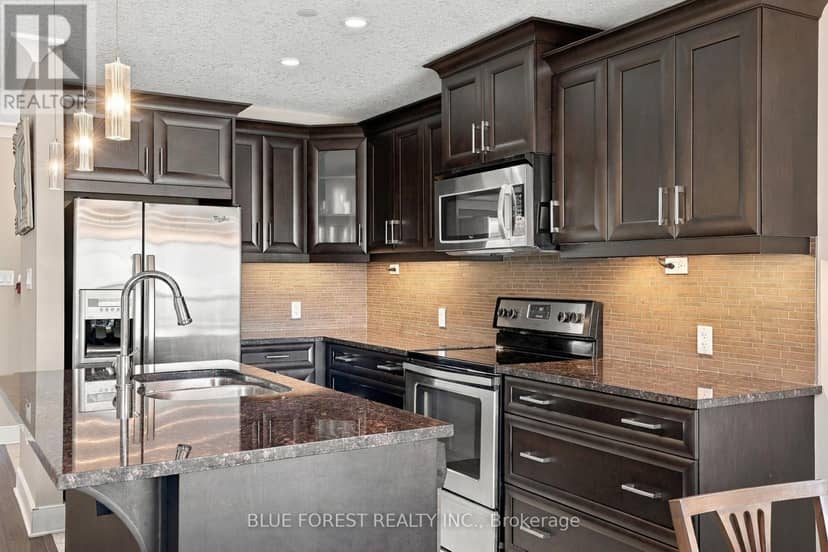 205 - 320 Sugarcreek Trail — photo 12 of 23