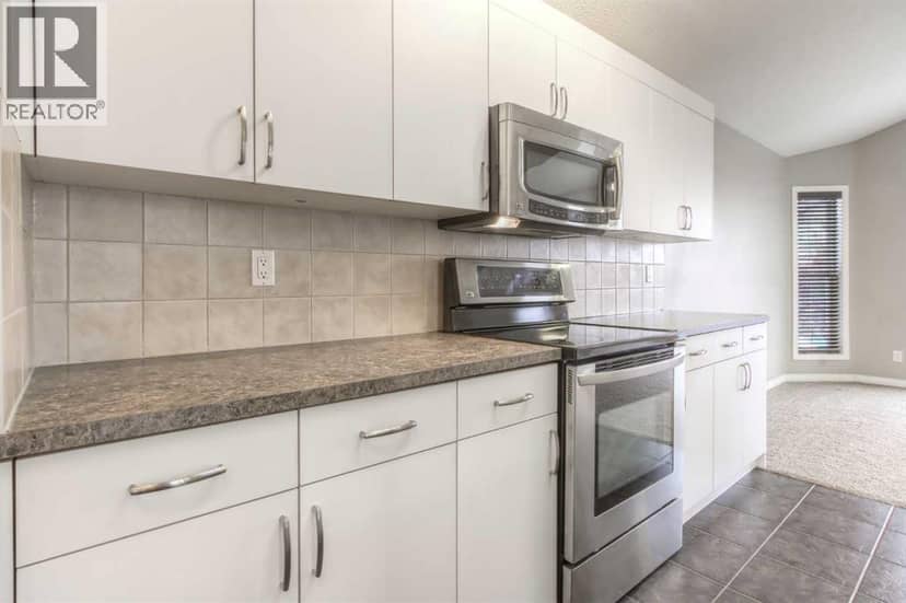 241 Morningside Gardens SW, Airdrie, photo 7