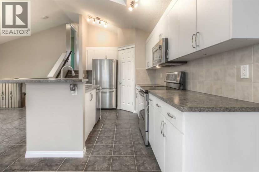 241 Morningside Gardens SW, Airdrie, photo 6