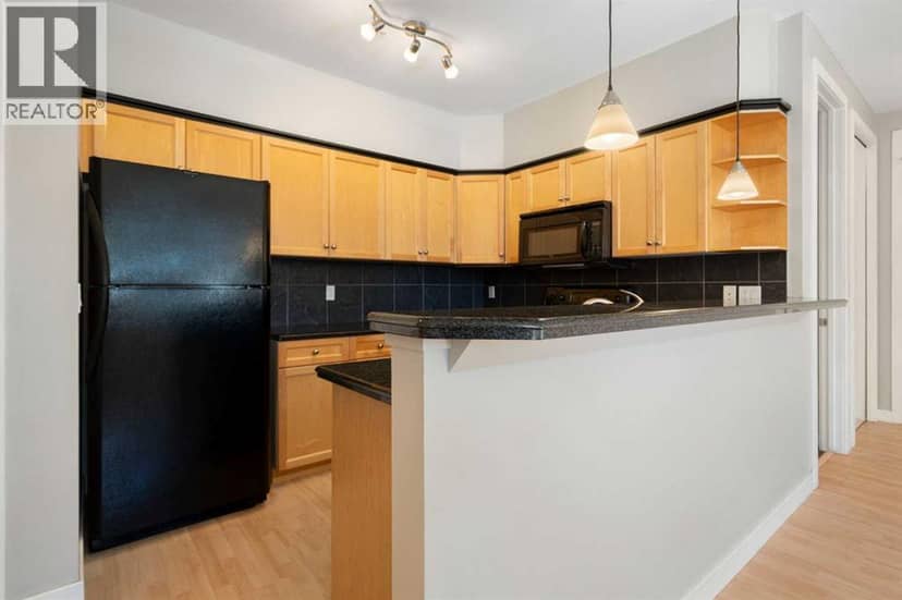 207, 303 19 Avenue SW — photo 9 of 40