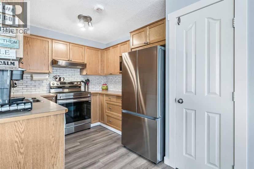 27, 156 Canoe Drive SW, Airdrie, photo 8