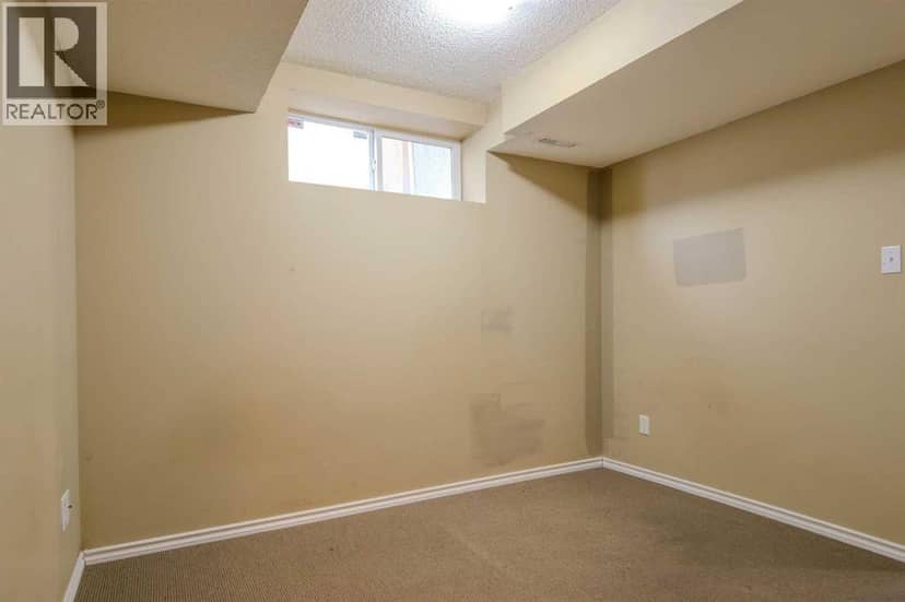 161 Saddlecrest Close NE — photo 36 of 40