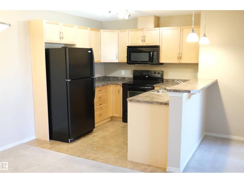 #223 5951 165 AV NW — photo 9 of 36