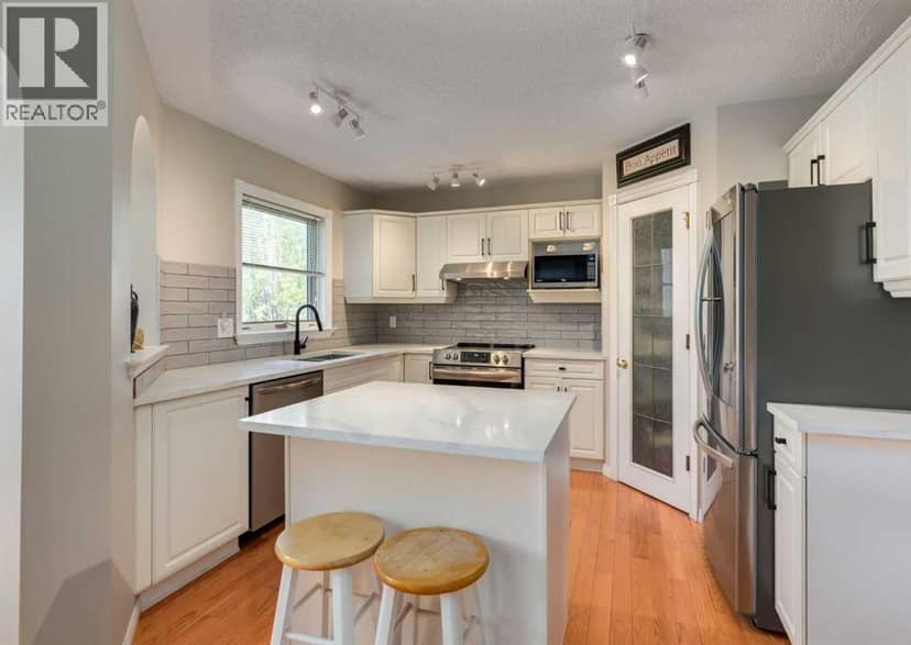 63 Arbour Lake Drive NW — photo 9 of 40
