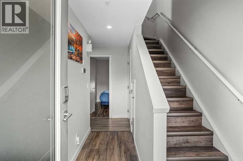 207, 105 Kananaskis Way — photo 19 of 35