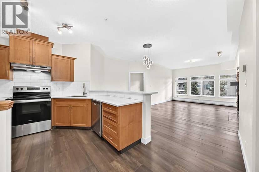 437, 10 Discovery Ridge Close SW — photo 9 of 36