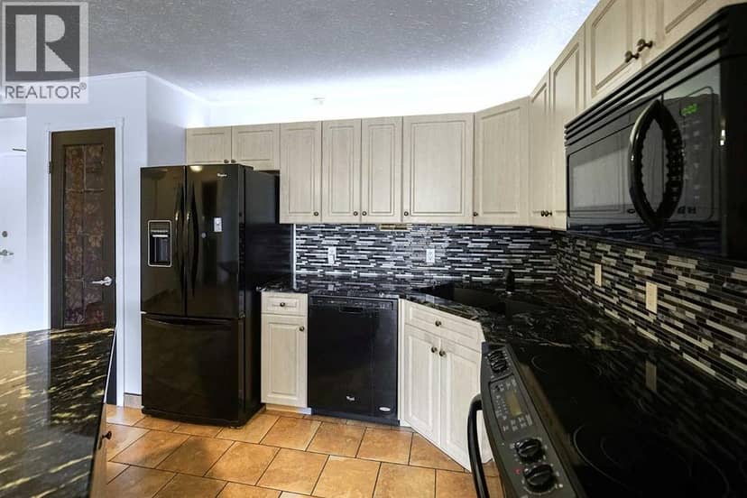 101, 4834 52A Street — photo 10 of 26