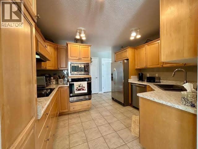 5515 W 57 AVENUE, Fort Nelson, photo 3