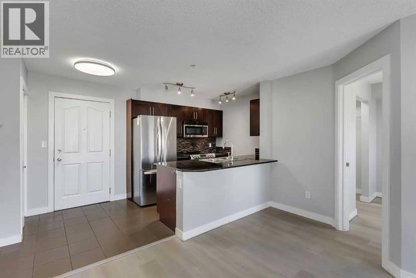 2402, 403 Mackenzie Way SW, Airdrie, photo 4