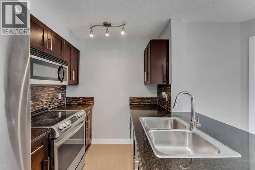 2402, 403 Mackenzie Way SW, Airdrie, photo 8