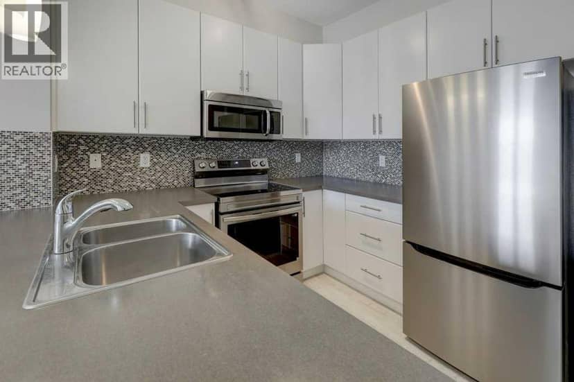 307, 207 Sunset Drive, Cochrane, photo 6