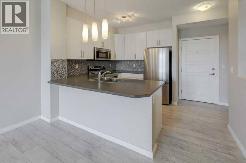 307, 207 Sunset Drive, Cochrane, photo 3